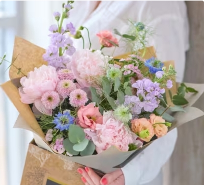 Birthday summer bouquet with peionies.