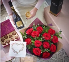 Luxury dozen red roses with prosecco and chocolates